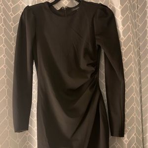 Black dress with shoulder pads
